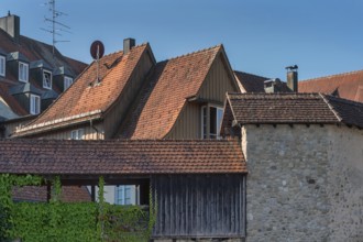 Pointed gable houses with tiled roofs and town wall with battlements, Isny, Swabia,