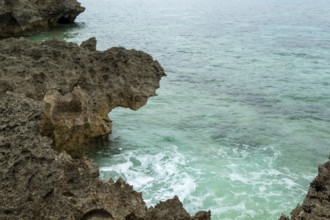 Sesoko's tail, rock formation, rugged cliffs of volcanic rock at the southern tip of Sesoko-jima,