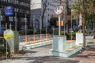 Urban design, close-up, orange Seiko clock and benches, Ikebukuro Living Loop, Public Furniture,