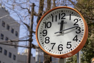 Urban design, close-up, orange Seiko clock, Ikebukuro Living Loop, Public Furniture,