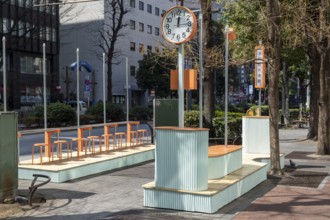 Urban design, close-up, orange Seiko clock and benches, Ikebukuro Living Loop, Public Furniture,