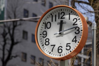 Urban design, close-up, orange Seiko clock, Ikebukuro Living Loop, Public Furniture,