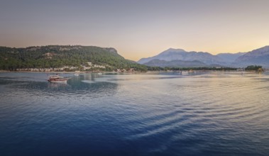 Seascape sunset panorama over the Mediterranean Sea near Kemer, Turkey. Panoramic view to the
