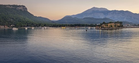 Seascape sunset panorama over the Mediterranean Sea near Kemer, Turkey. Panoramic view to the