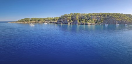 Wonderful Paradise bay of Camyuva, Kemer, Turkey. Scenery panoramic view of the coast with boats on