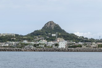 View of the harbour and Mount Gusuku on Ie-jima, Ie Island, Motobu, Kunigami District, Okinawa,