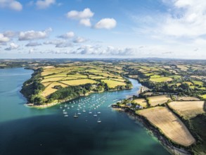 Farms and Fields over St Mawes from drone, Carrick Roads, River Fal, Falmouth, Cornwall, UK