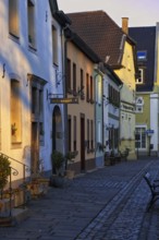 Colourful old town alley with traditional architecture in the evening light, Krefeld