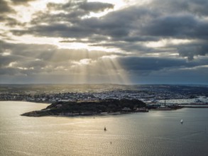Sunset over Pendennis Castle and Pendennis Point from a drone, Falmouth, Cornwall, UK
