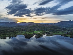 Sunset over Windermere Lake from a drone, Ambleside, Lake District, Cumbria, England, United