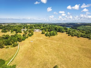 Trelissick House and Garden from drone, Carrick Roads, River Fal, Feock, Truro, Cornwall, UK