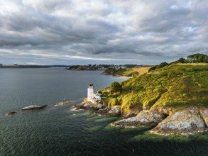 St Anthony Lighthouse from drone, Roseland peninsula, Head circular walk, Cornwall, UK