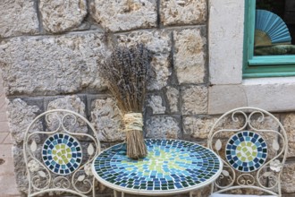 Lavender in bloom, alley in the old town centre, Starigrad, island of Hvar, Dalmatia, Croatia