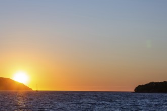 Sunset over the sea, sailing ship, near Starigrad, Dalmatia, Croatia