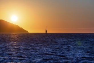 Sunset over the sea, sailing ship, near Starigrad, Dalmatia, Croatia
