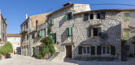 Trg Skor, Skor Square, panoramic view, stone houses in the old town centre, Starigrad, island of