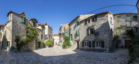 Trg Skor, Skor Square, panoramic view, stone houses in the old town centre, Starigrad, island of