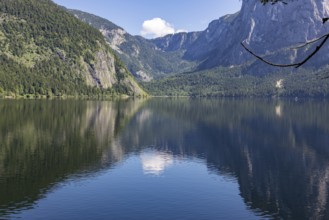 Lake Altaussee with mountains and wooded shores reflected in the water, Altaussee, Styria, Austria