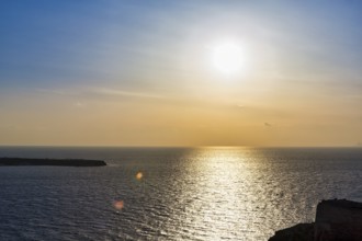 Sunset by the sea, Halo, Cirrus, Oia, Thira, Santorini, Cyclades, Greece