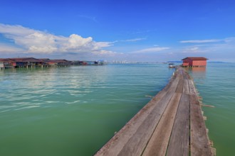 Boardwalk leading to a wooden house, Tan Jetty, George Town, Penang, Malaysia