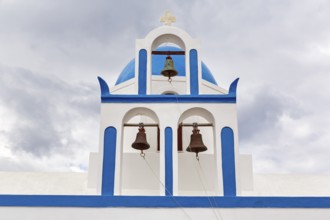 Blue and white bell tower, Mikros Profitis Ilias church, hiking trail from Fira to Oia, Thira,