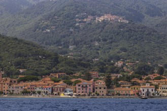 The harbour of Marziana Marina, behind the mountain village of Poggio, Elba Island, Tuscan