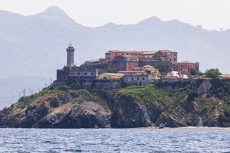 Fortress Forte Stella with lighthouse, behind the mountains Monte Serra and Monte Strega,