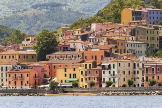 The village of Rio Marina with its pastel-coloured house facades, Elba Island, Tuscan Archipelago