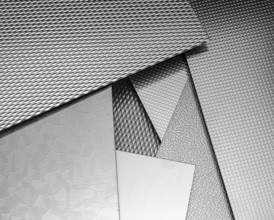 Variation of some abstract fine structured metallic surfaces