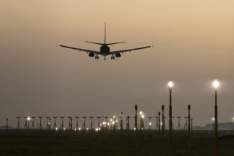 Boeing 737 jet passenger aircraft of Ryanair airlines in flight landing at sunset at London