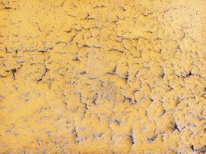 Yellow wall with cracked and peeling surface Lower Austria Austria