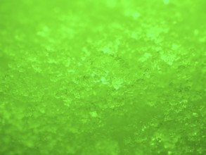 Green illuminated ice crystals as background, blurred background, North Rhine-Westphalia, Germany
