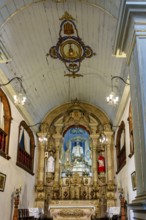 Altar and interior of an old baroque church in the historic city of Ouro Preto in Minas Gerais,