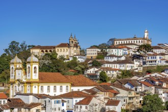 View of the historic city of Ouro Preto with a church and mansions in Baroque and Colonial styles,