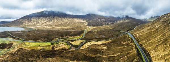 Panorama of Eas a' Bhradain Waterfall from drone, Red Cuillin mountains, Loch Ainort, Isle of Skye,