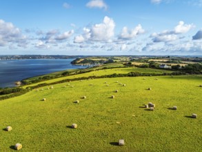 Farms and Fields over St Mawes from drone, Carrick Roads, River Fal, Falmouth, Cornwall, UK