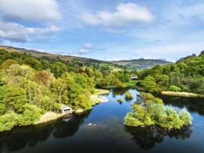 Farms and Mountains over road A591 from a drone, Grasmere Lake, Grasmere, Ambleside, Lake District,