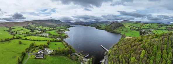 Panorama of Farms and mountains over Ullswater Lake from drone, Pooley Bridge, Lake District