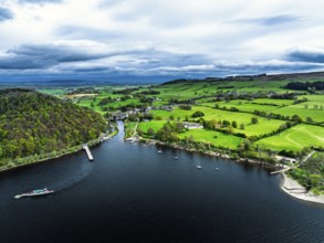 Farms and mountains over Ullswater Lake from drone, Pooley Bridge, Lake District National Park,