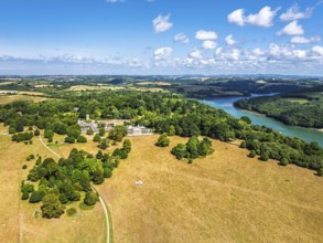 Trelissick House and Garden from drone, Carrick Roads, River Fal, Feock, Truro, Cornwall, UK