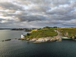 St Anthony Lighthouse from drone, Roseland peninsula, Head circular walk, Cornwall, UK