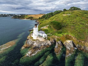 St Anthony Lighthouse from drone, Roseland peninsula, Head circular walk, Cornwall, UK