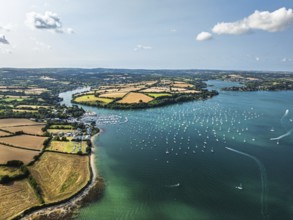 Mylor Churchtown Village from a drone, Carrick Roads, River Fal, Falmouth, Cornwall, UK