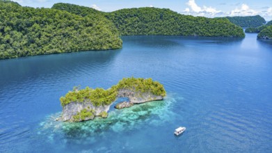 Aerial view bird's eye view of rock arch Natural Arch in lagoon of in island paradise island state