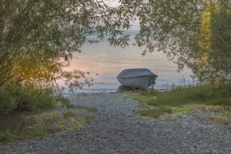 Rowing boat on the shore of Reichenau Island, Lake Constance, Baden-Württemberg, Germany