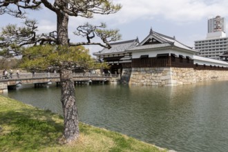 Hiroshima Castle, also known as Carp Castle, entrance gate and moat, replica of the original