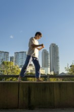 Vertical shot of mastering the art of Jiu Jitsu with a city view