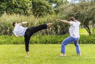 Synergy in motion during outdoor Taekwondo training