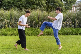 A dynamic Taekwondo session under the sun