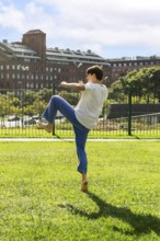 Concentrated Taekwondo training on a sunny day